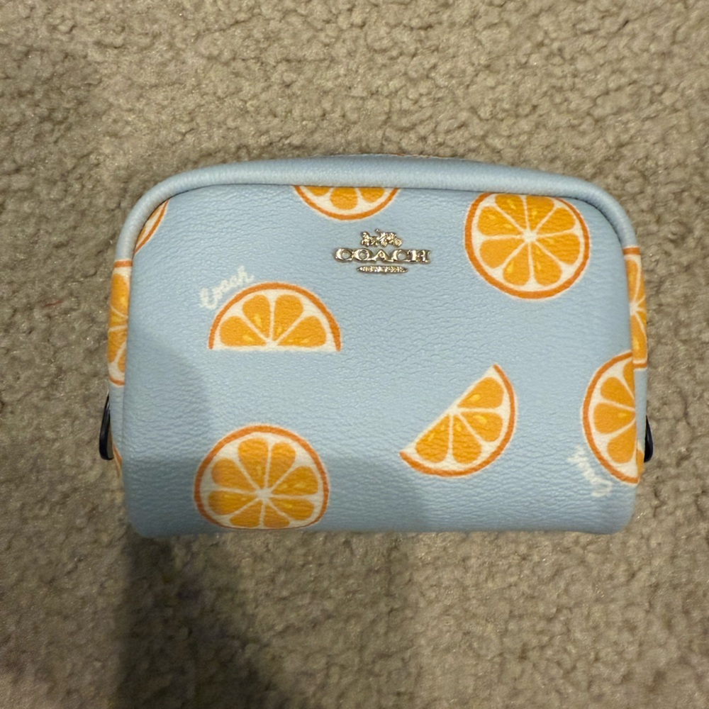 Coach Light Blue Wallet with Orange Slice Design